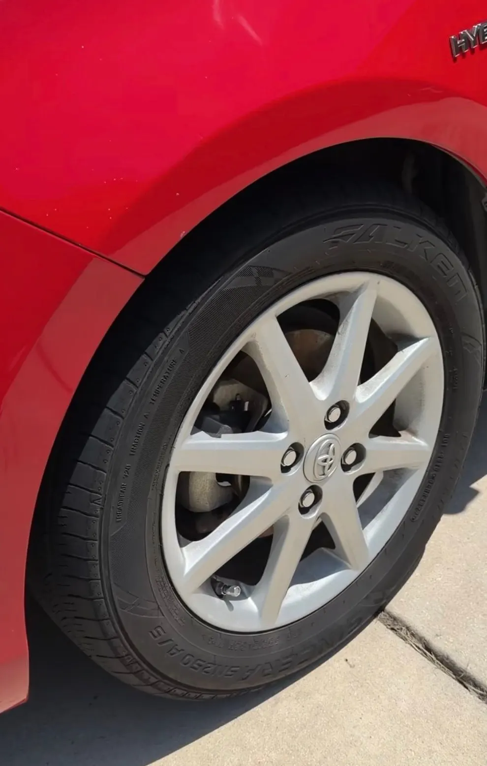 The same Prius wheel after decontamination, spokes and barrel clean, the tire dressed.